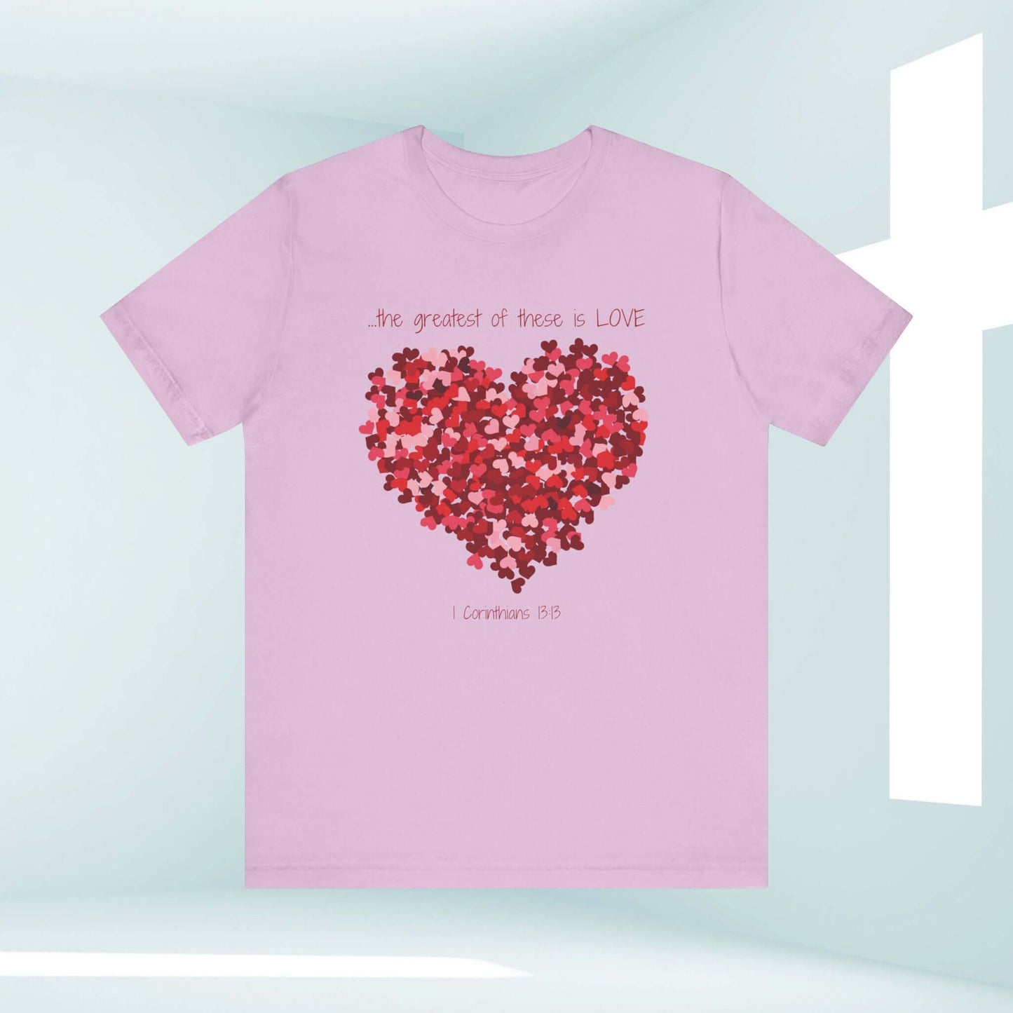 Christian Valentines Day T-Shirt with Heart Design and "The Greatest of These Is Love" Text in Pink