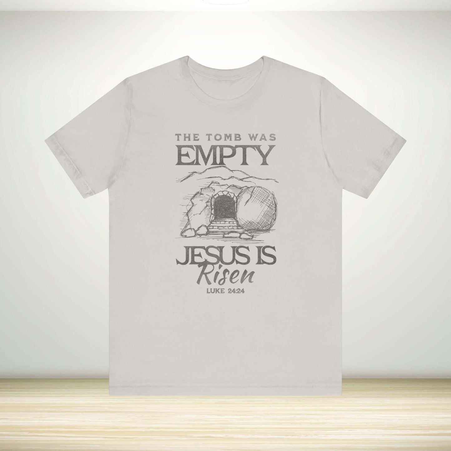 Christian Easter shirt with "The Tomb Was Empty Jesus Is Risen" graphic design, perfect religious Easter clothing and Christian Easter apparel.