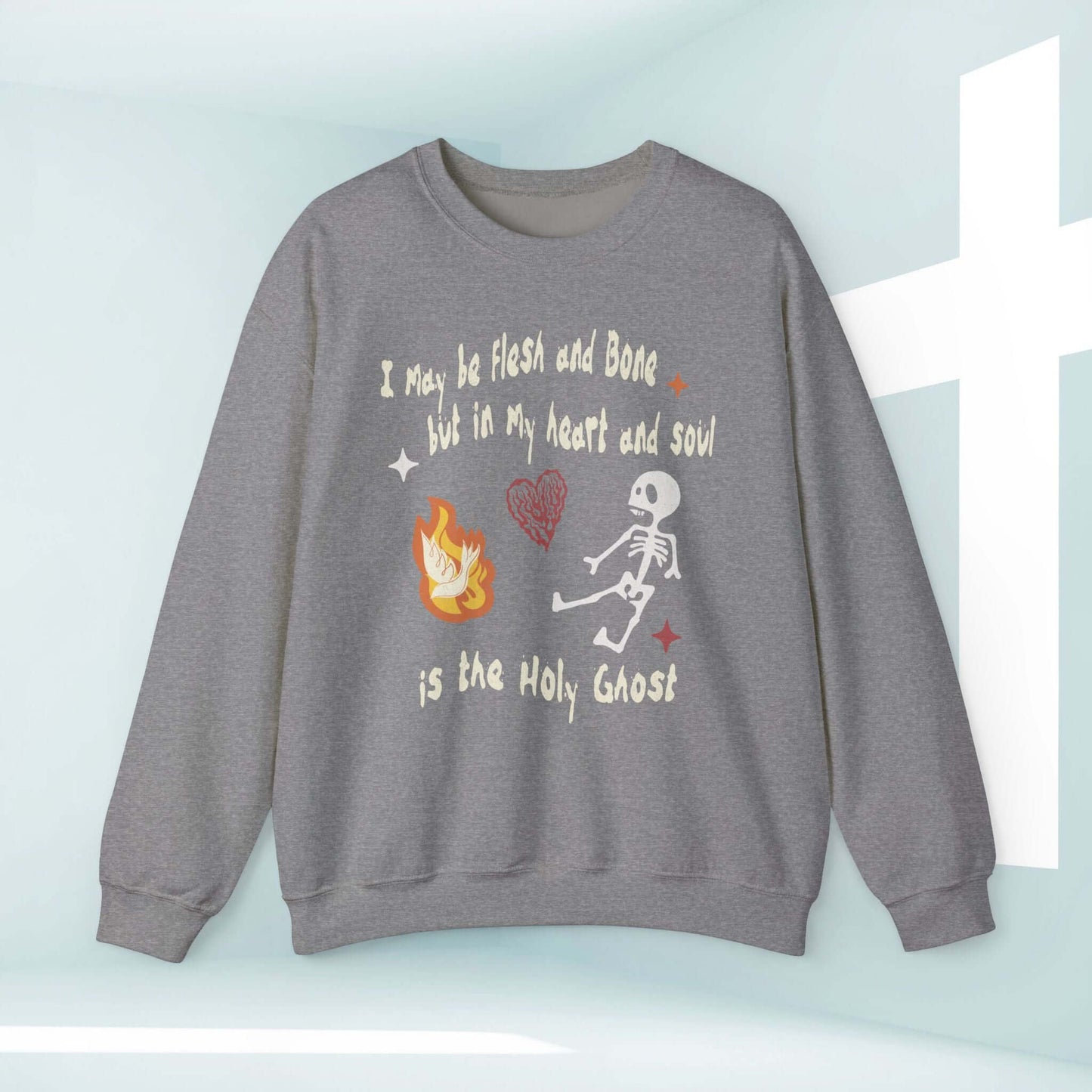 Christian Halloween sweatshirt with skeleton graphic, "I May Be Flesh And Bone But In My Heart And Soul Is The Holy Ghost" design.