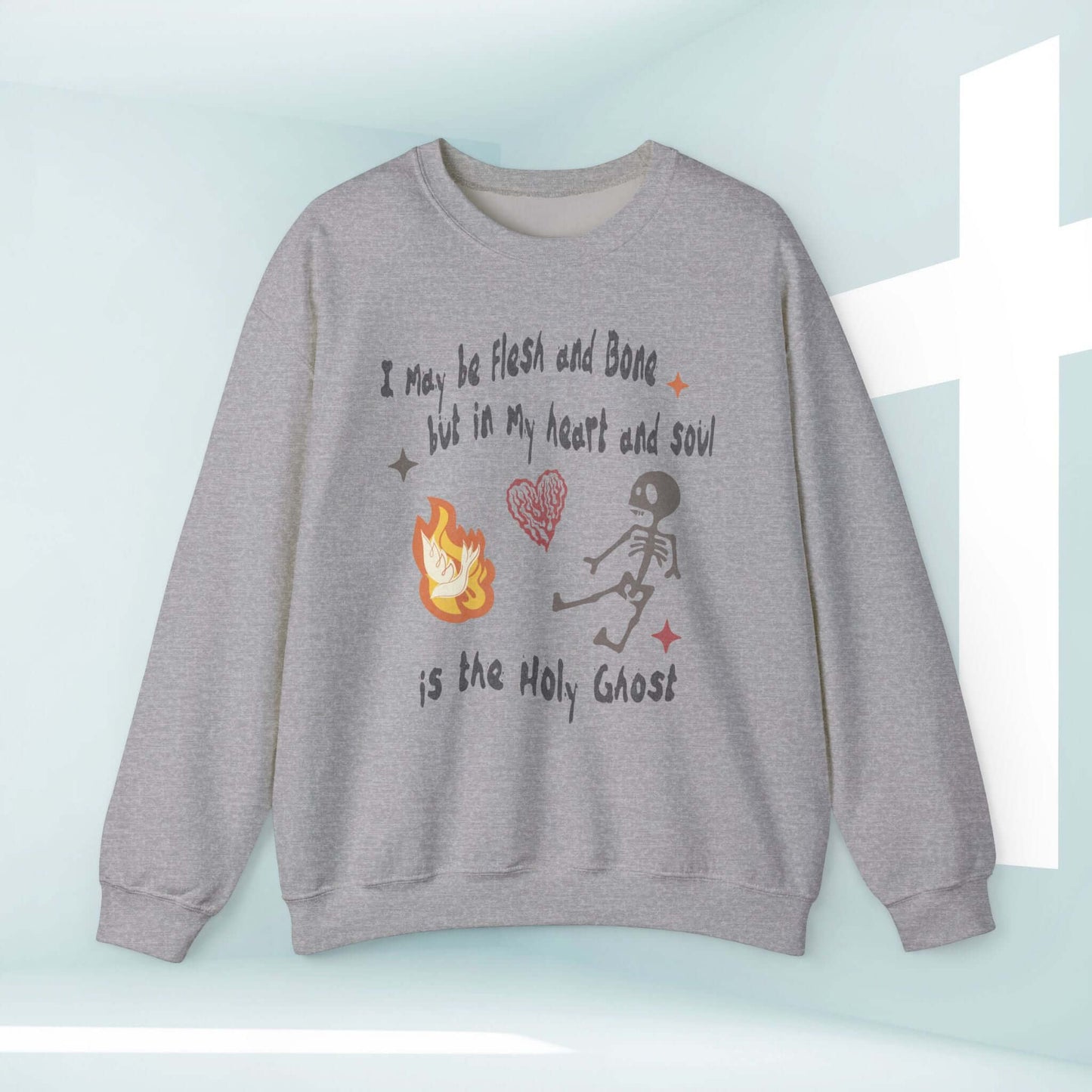 Christian Halloween sweatshirt with "I May Be Flesh And Bone But In My Heart And Soul Is The Holy Ghost" design, faith-themed apparel.