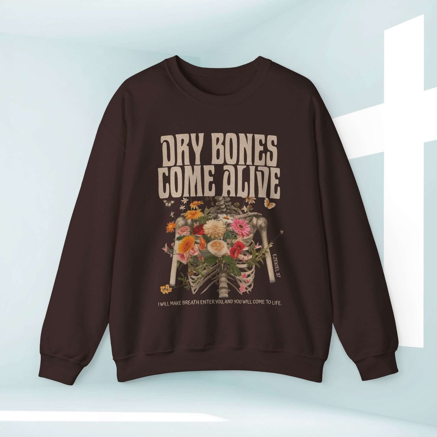 Christian Halloween sweatshirt with "Dry Bones Come Alive" design featuring skeleton and flowers, inspired by Ezekiel 37.