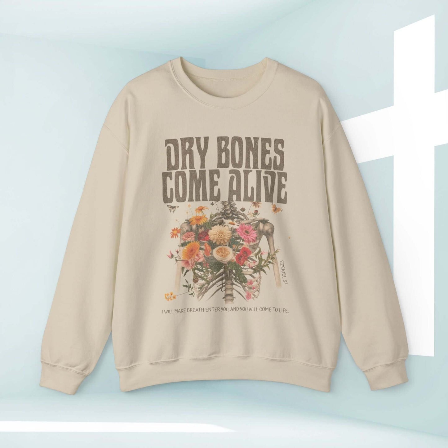 Christian Halloween sweatshirt with "Dry Bones Come Alive" design featuring a floral skeleton, inspired by Ezekiel 37 Bible verse.