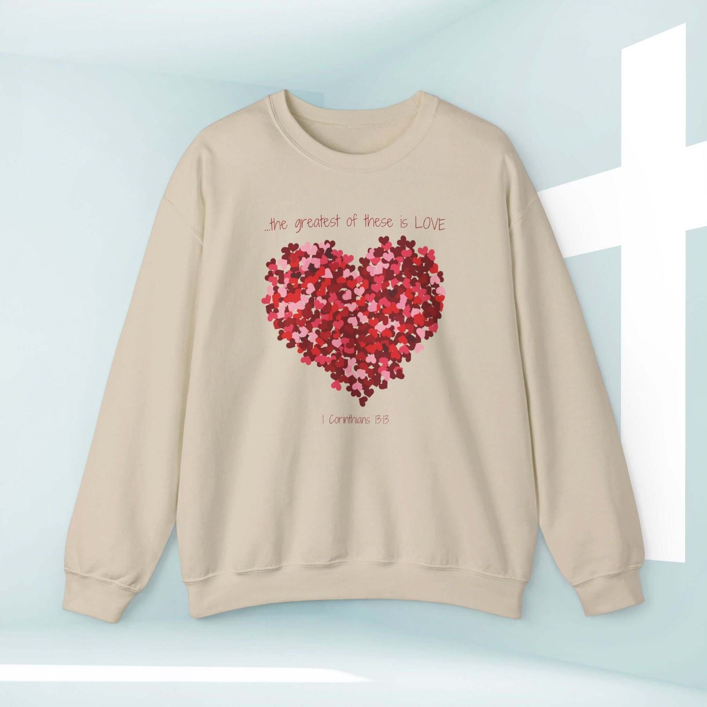 Christian greatest love sweatshirt with heart graphic and Bible verse design, perfect for wedding, anniversary, or valentines day gift