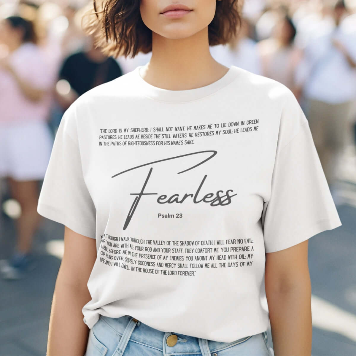 Woman wearing a Fearless T-Shirt inspired by Psalm 23, part of the Christian apparel collection, ideal for sharing your personal testimony.