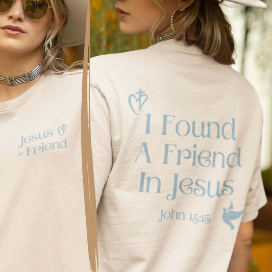 Woman wearing "I Found A Friend In Jesus" Christian t-shirt with Bible verse John 15:15. High-quality faith-based apparel showcasing religious message.