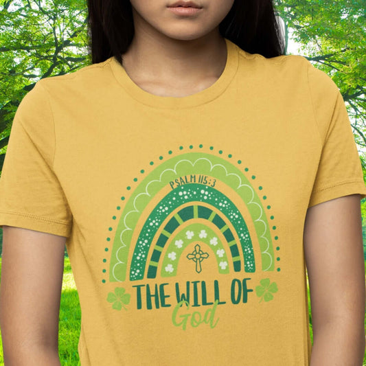 Christian St Patrick's Day shirt with Psalm 115:3, shamrock rainbow design, inspirational clover tee, "The Will of God" text.