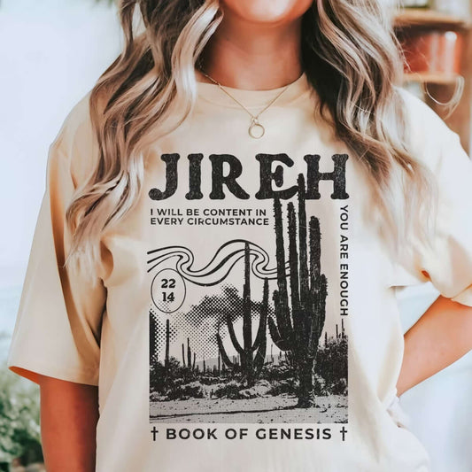 Woman wearing Jireh Christian graphic tee with cactus design and Bible verse, promoting faith-based inspirational Christian apparel.