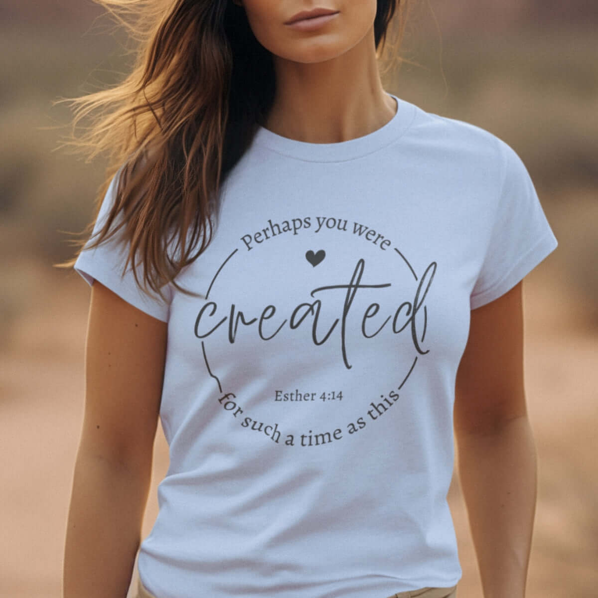 Woman wearing a Christian tee shirt with the Bible verse "Perhaps You Were Created for Such a Time as This" from Esther 4:14.