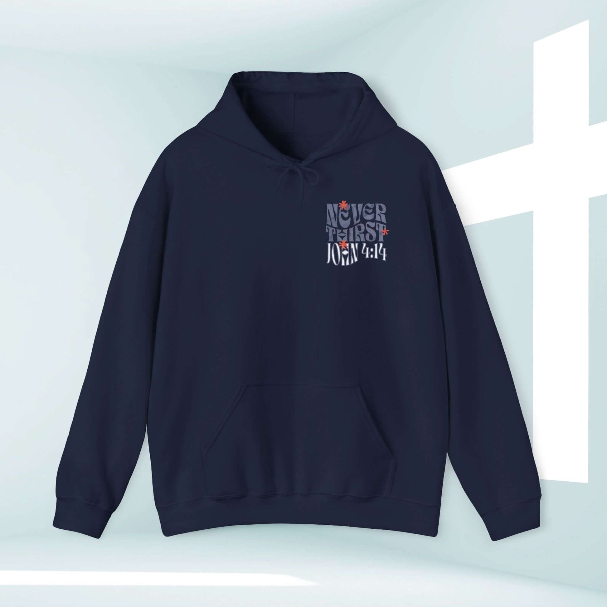 Christian hoodie with "Living Water Never Thirst" bible verse design on a navy blue hooded sweatshirt in front of a white cross.