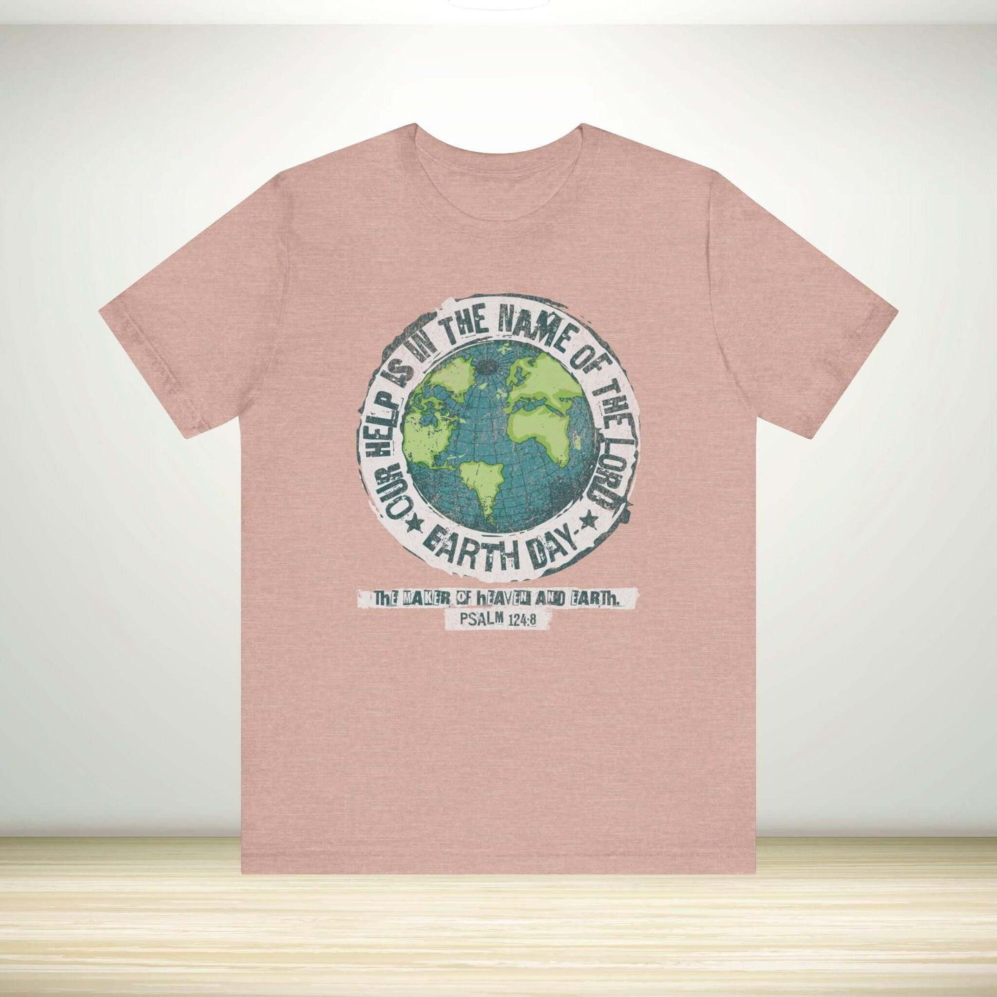 Christian Earth Day shirt with globe design and Psalm 124:8 verse, promoting faith and unity through Christian apparel.