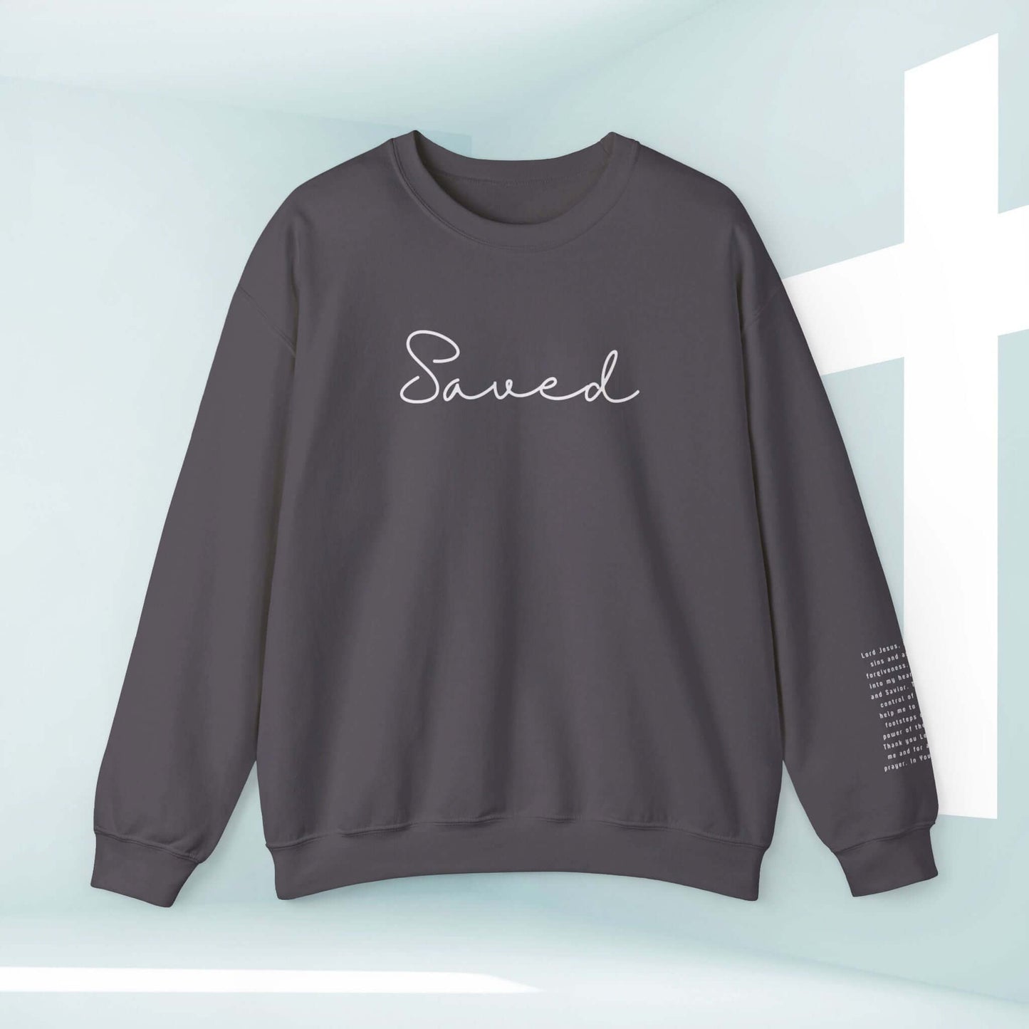 Christian sweatshirt with "Saved" on front and Sinners Prayer on sleeve, perfect for religious apparel and inspirational faith-wear. Ideal baptism gift.