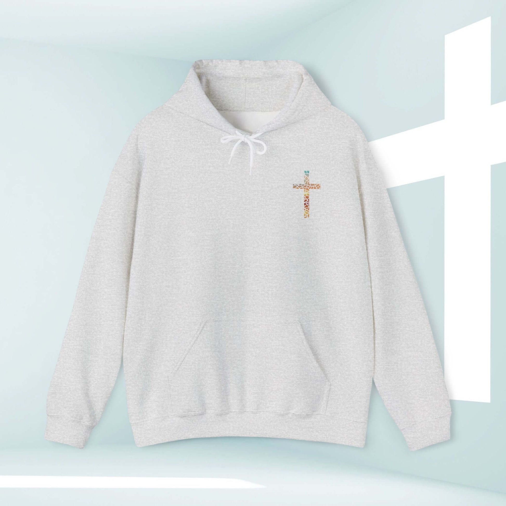 God Turns Broken Pieces Into Masterpieces Christian hoodie with cross graphic design in light background, Christian gifts, worship hoodie.