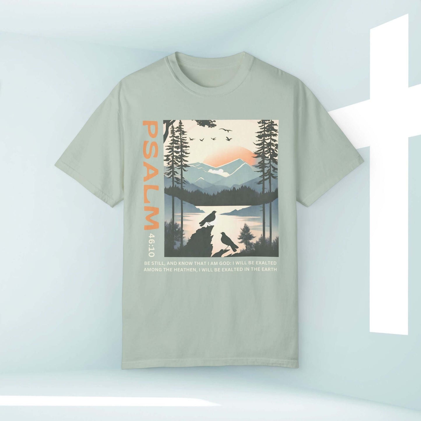 Peace Be Still Birds Christian t-shirt with Psalm 46:10, featuring birds and mountains, ideal faith-based Christian clothing and inspirational shirt.