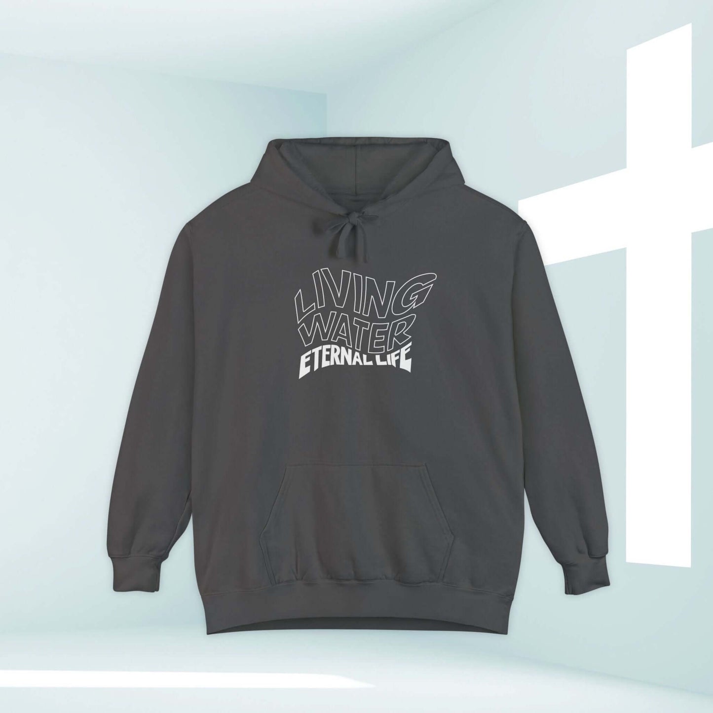 Living Water Eternal Life Christian hoodie with Bible verse design in front of cross background, perfect faith-based apparel.