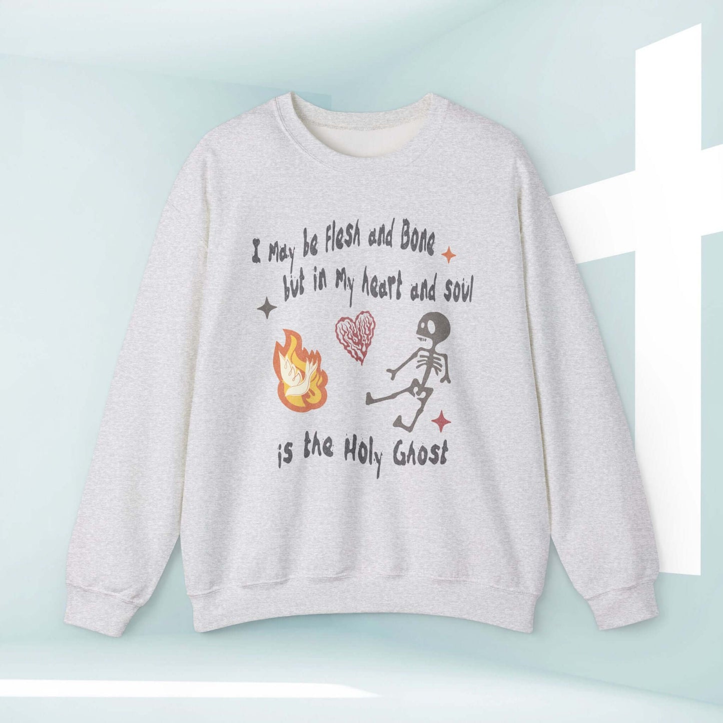 Christian Halloween sweatshirt featuring "I May Be Flesh And Bone But In My Heart And Soul Is The Holy Ghost" with skeleton graphic.