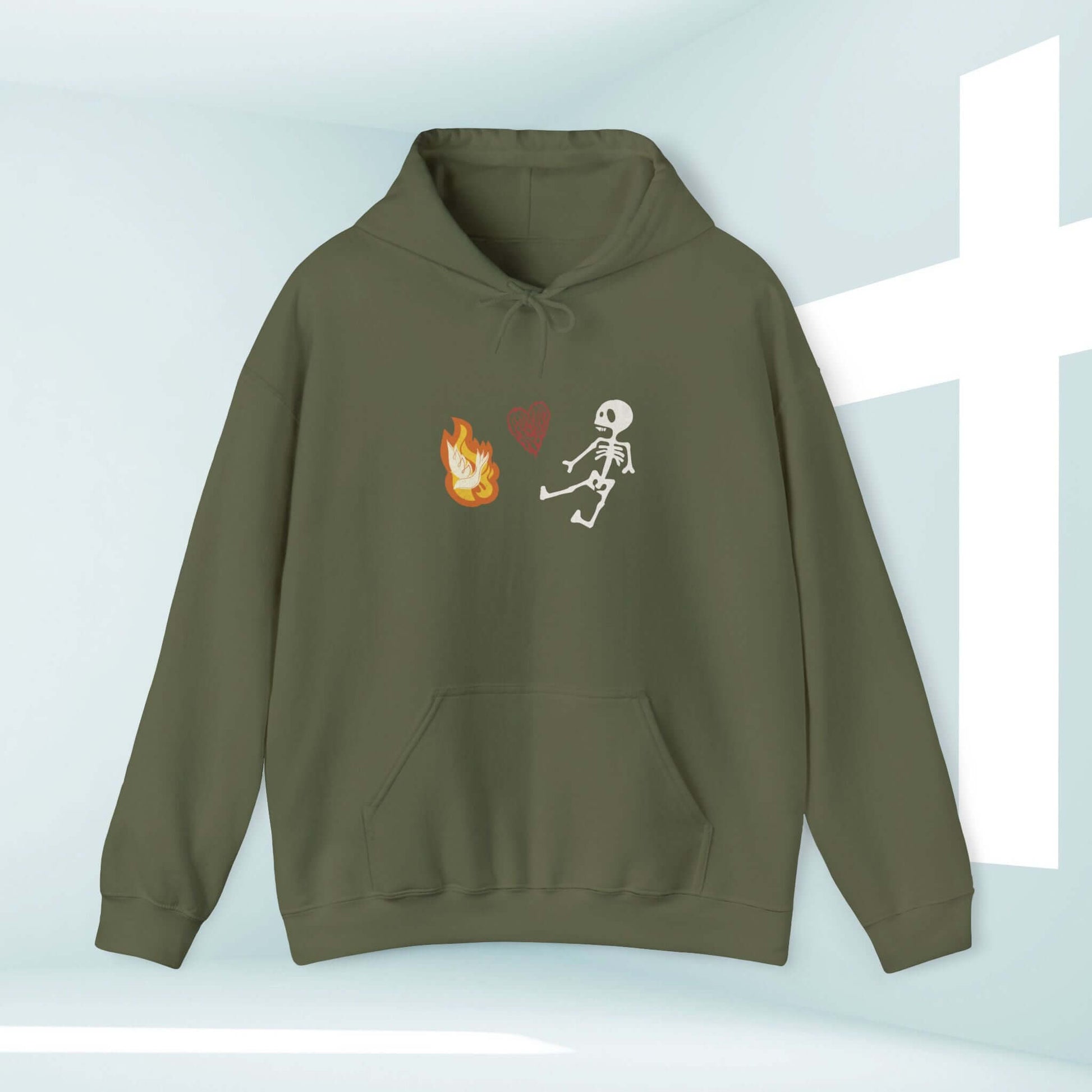 Christian Halloween hoodie with dancing skeleton, flame, and heart design on green sweatshirt; perfect Halloween gift.