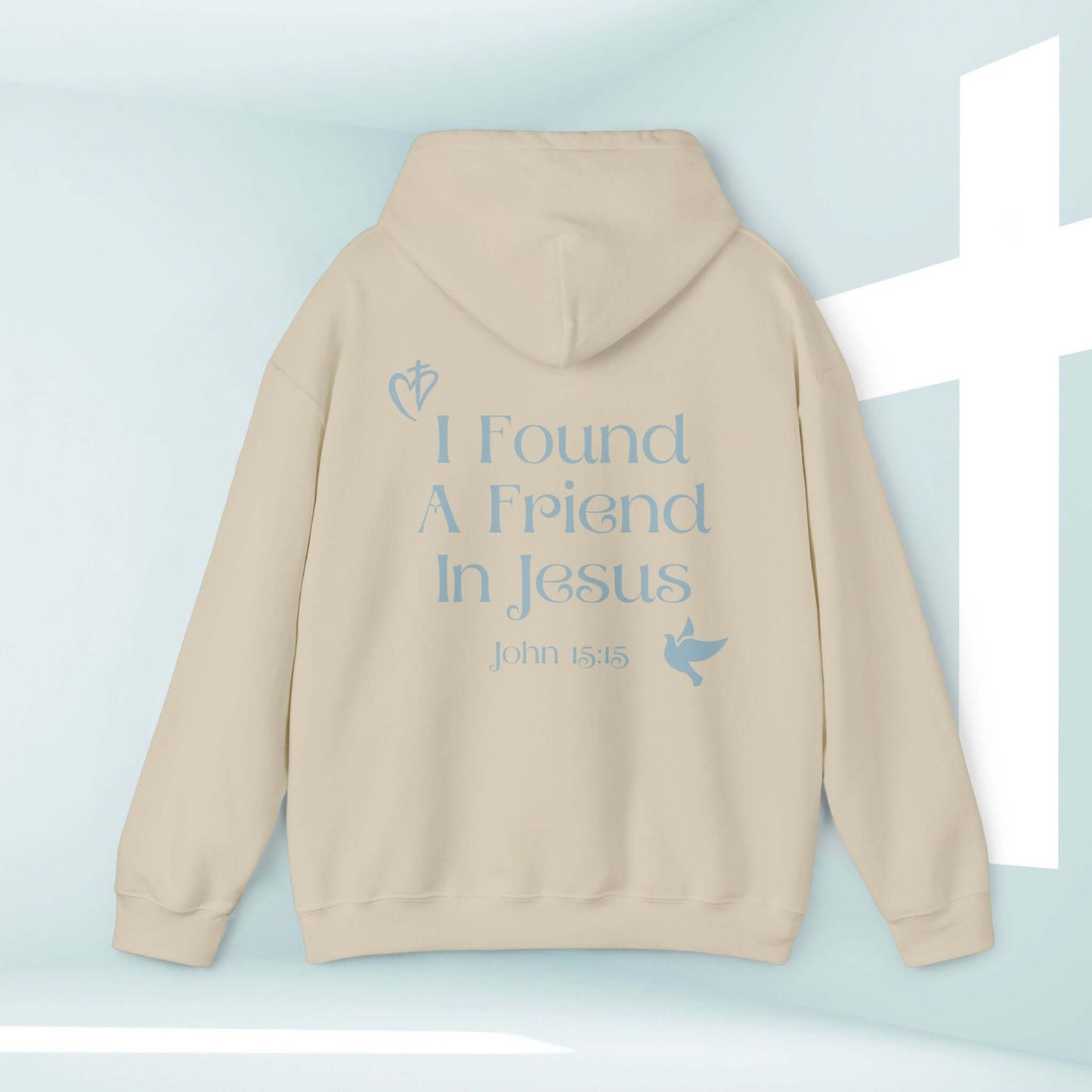 Beige Christian hoodie with "I Found A Friend In Jesus" text and Bible verse John 15:15, featuring a cross and bird graphic, faith-based sweatshirt