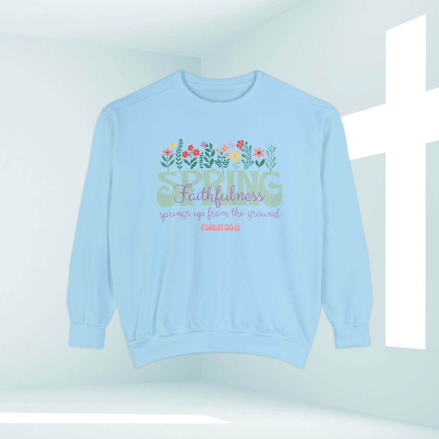 Light blue crewneck sweatshirt featuring a floral design with a Bible verse, suitable for spring and faith-based Christian apparel.