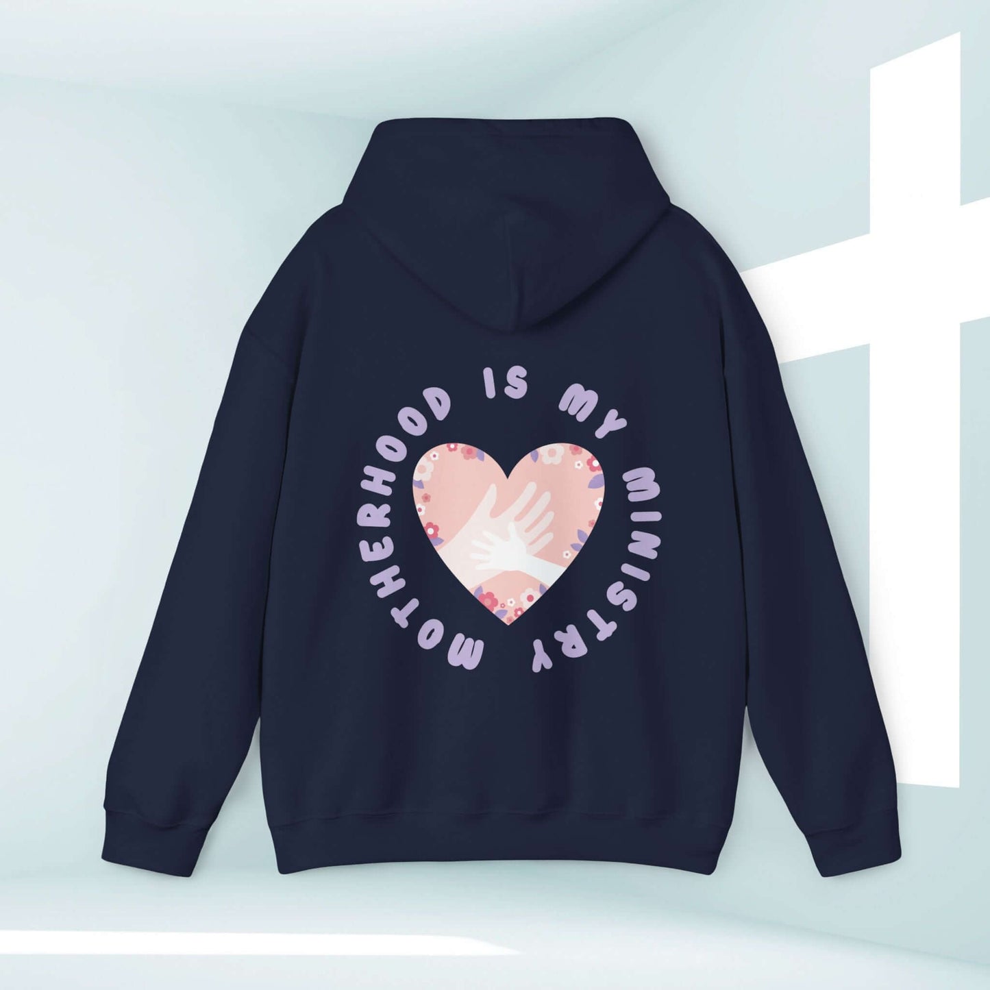 Motherhood Is My Ministry Christian hoodie with heart design, perfect gift for mom, homeschoolers, and new moms.