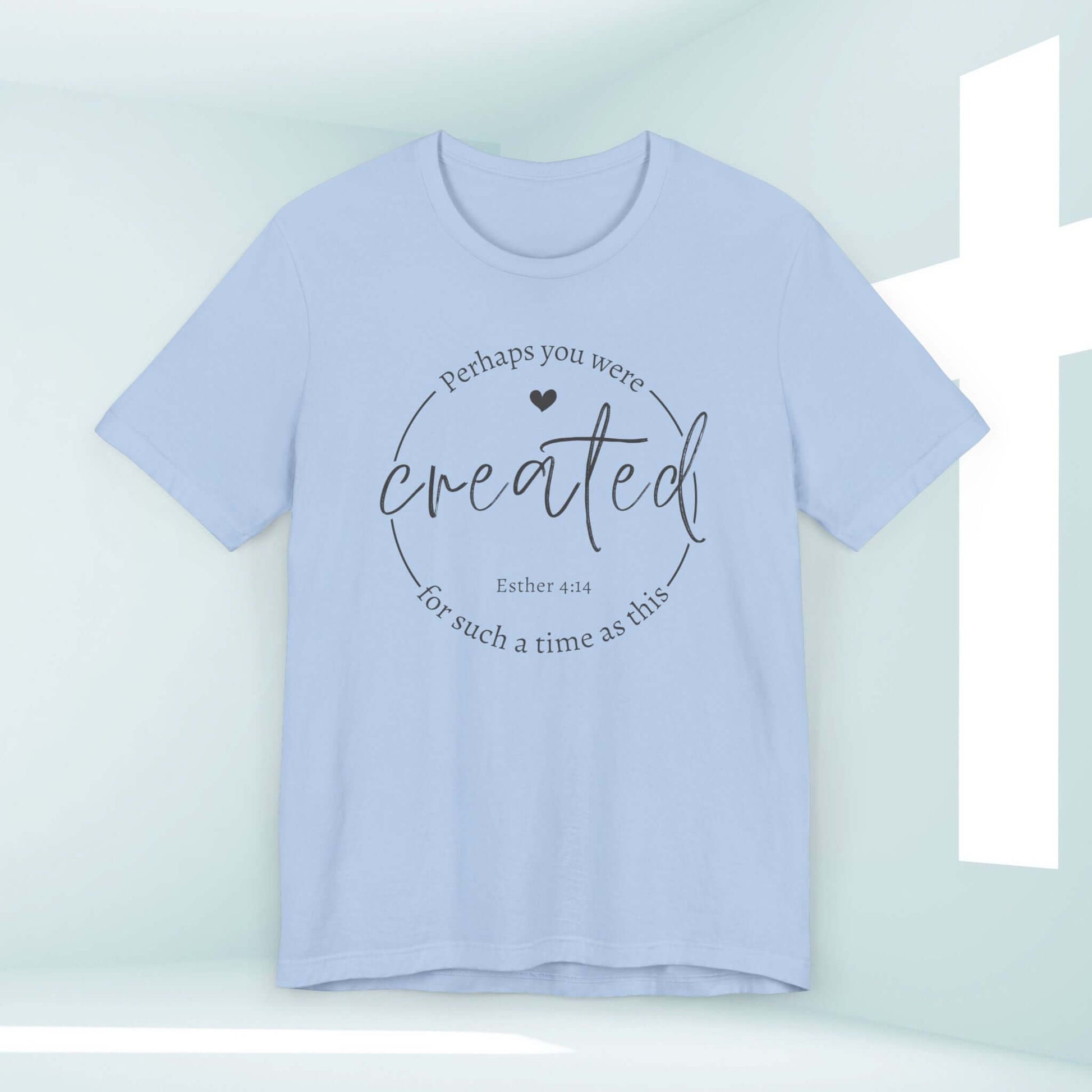 Women's Christian t-shirt with "Perhaps You Were Created For Such A Time As This, Esther 4:14" Bible verse printed on a light blue Jesus shirt.