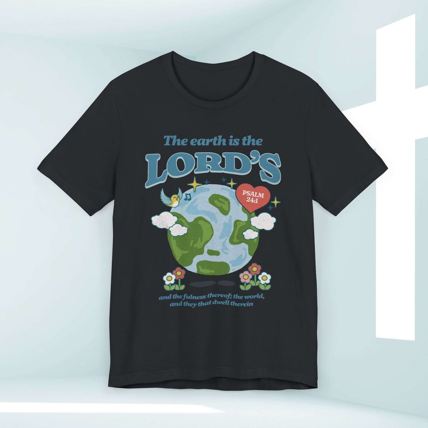 Christian Earth Day nature camping shirt with Bible verse "The Earth Is The Lord's" graphic on a black t-shirt.