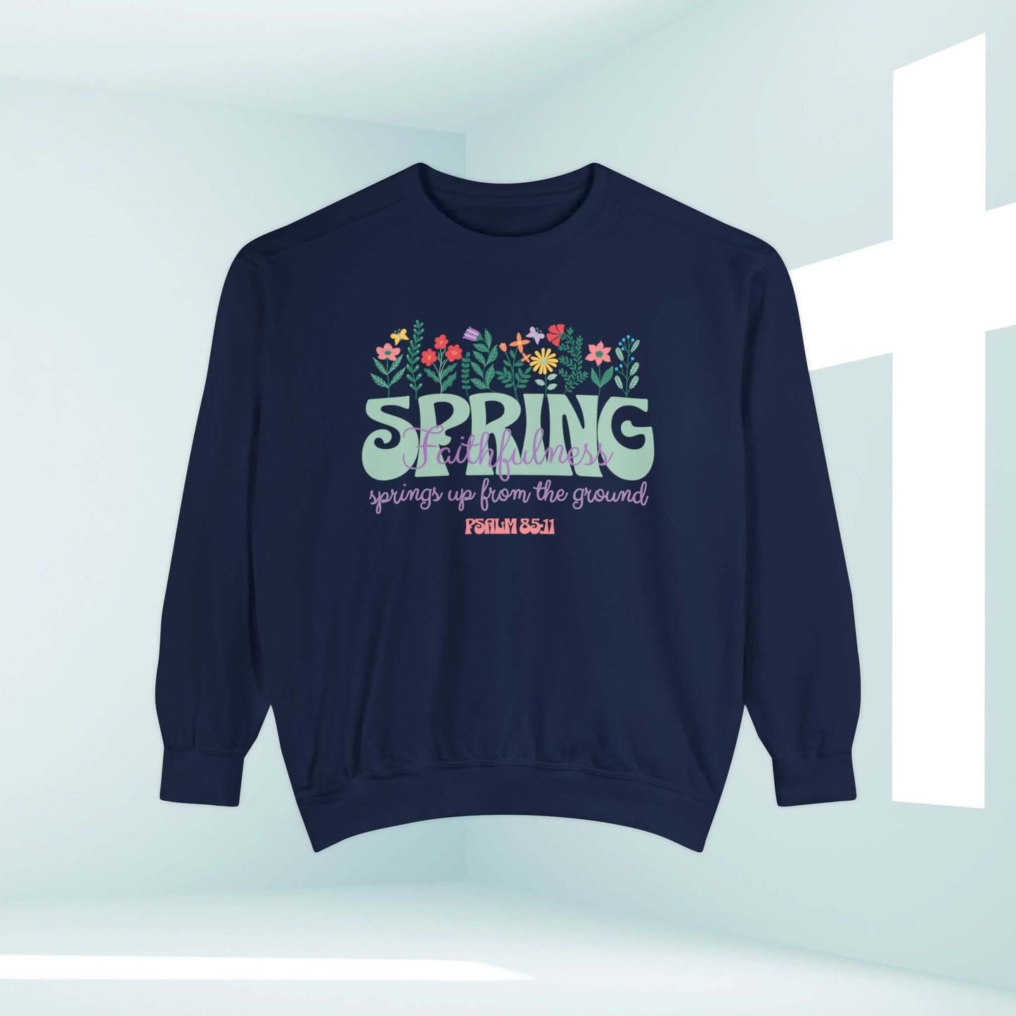 Christian apparel sweatshirt with biblical verse, floral design, and spring theme, emphasizing faith and inspiration.