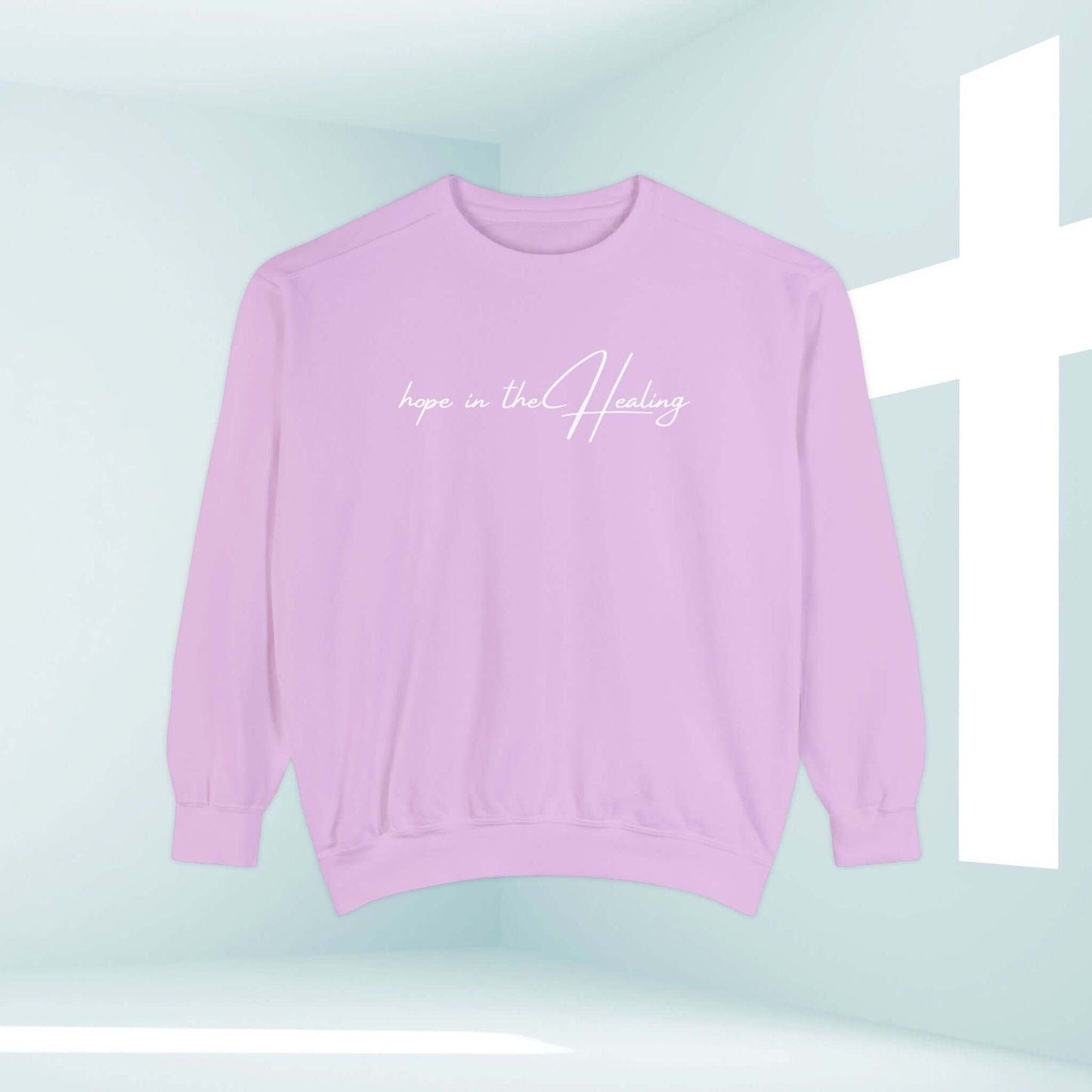 "Hope In The Healing crewneck Christian sweatshirt in pink for cancer survivors and get well soon gifts, featuring a bible verse quote"