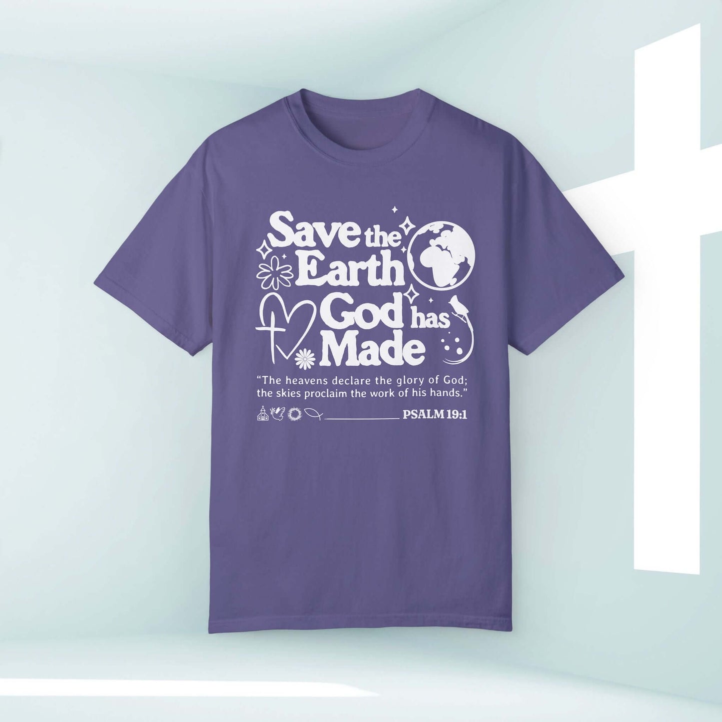 Save the Earth Day Christian T-Shirt with Psalm 19:1 verse displayed on a purple tee against a light background with a cross.