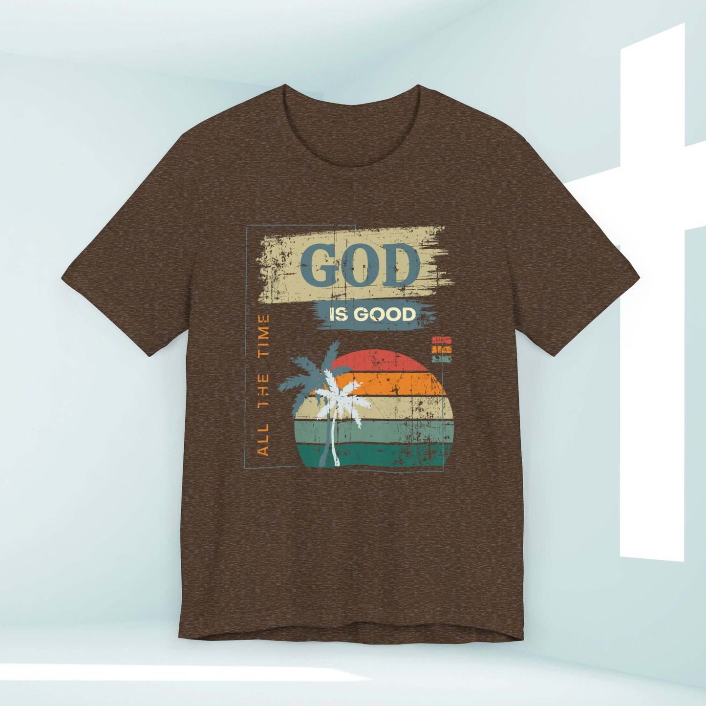 God Is Good All The Time women's Christian T-shirt in brown with a palm tree and sunset design, promoting faith through Christian apparel