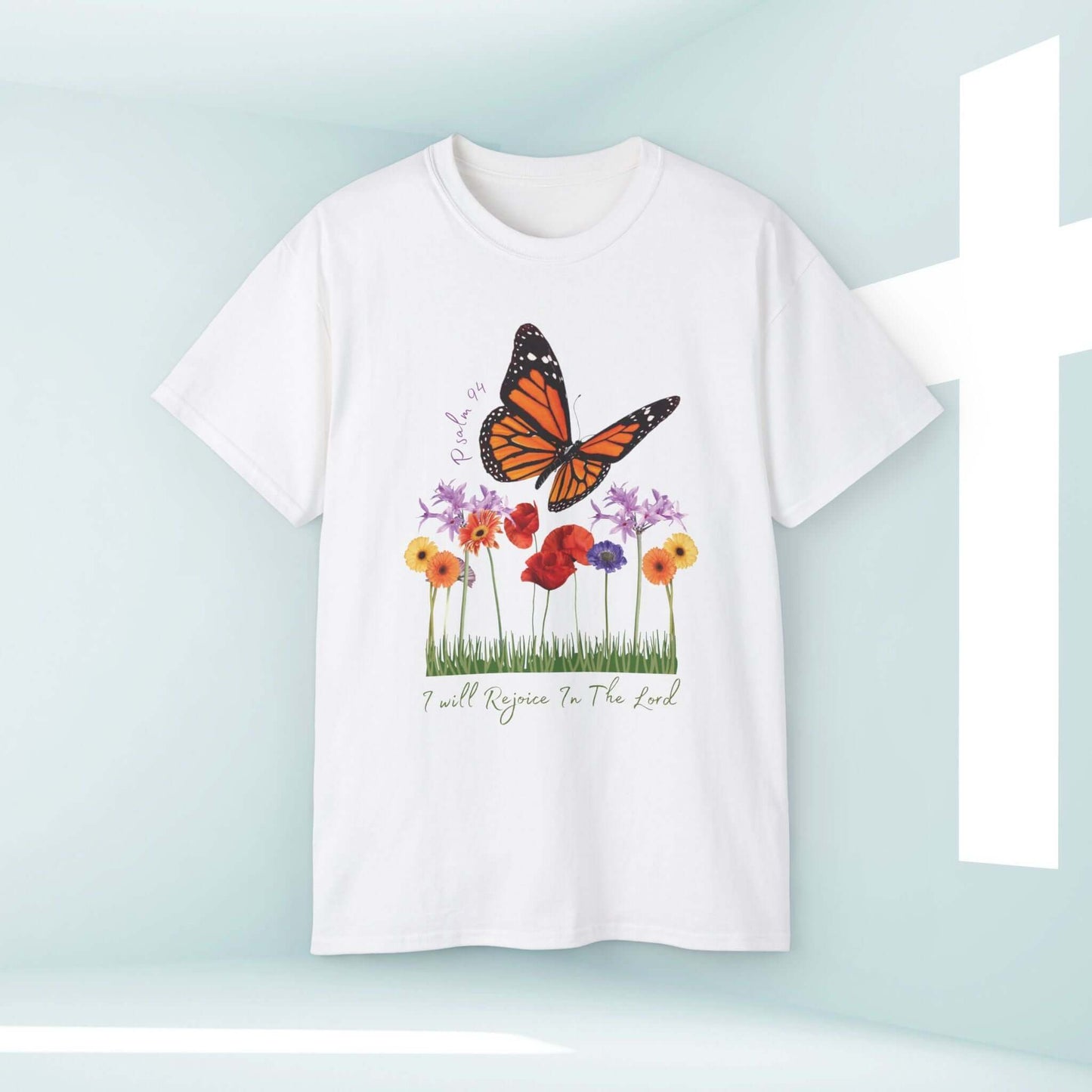 Christian T-shirt with butterfly and floral design featuring "I Will Rejoice To The Lord" scripture, ideal faith-based apparel.