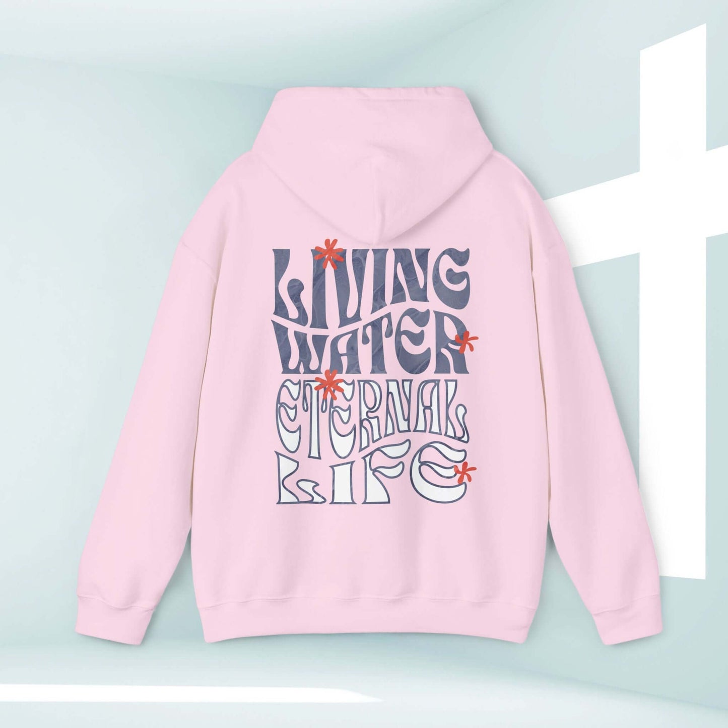 Pink Living Water Never Thirst Christian hoodie with a boho design and Bible verse, featuring a hood and spacious kangaroo pocket.