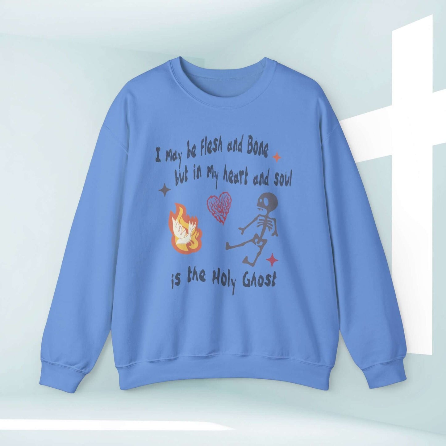 Christian Halloween sweatshirt with a dancing skeleton and "I May Be Flesh And Bone But In My Heart And Soul Is the Holy Ghost" text.