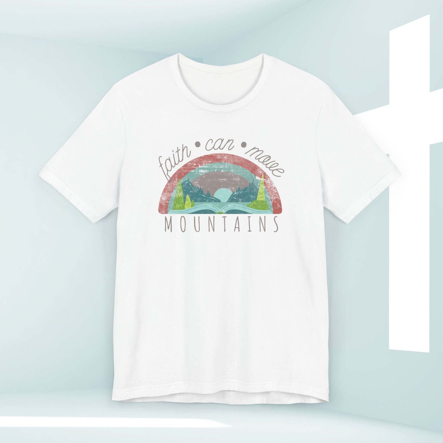 Faith Can Move Mountains women's Christian t-shirt with rainbow and mountain design, perfect religious shirt expressing Christian values and inspiration