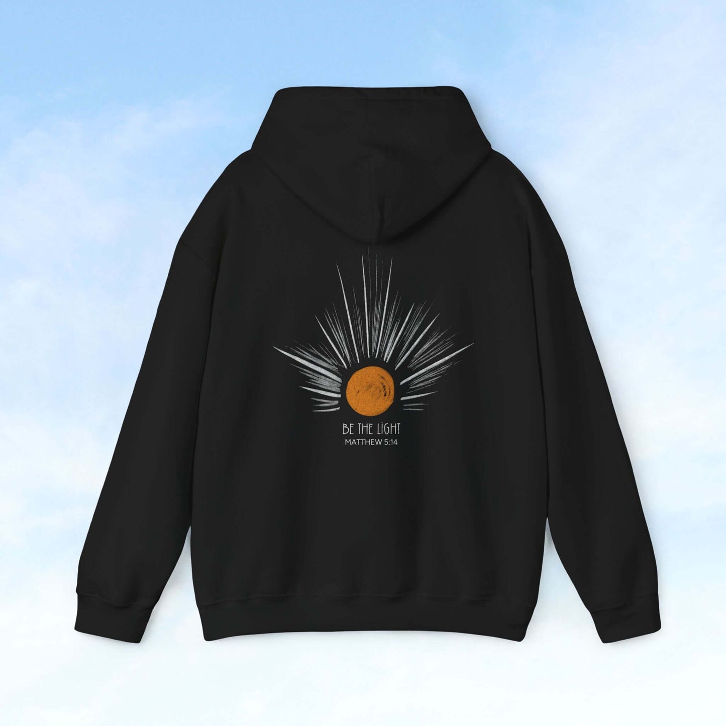 Be The Light Sunburst Christian hoodie with celestial sun and rays graphic, black hoodie back view, Christian apparel and gifts.