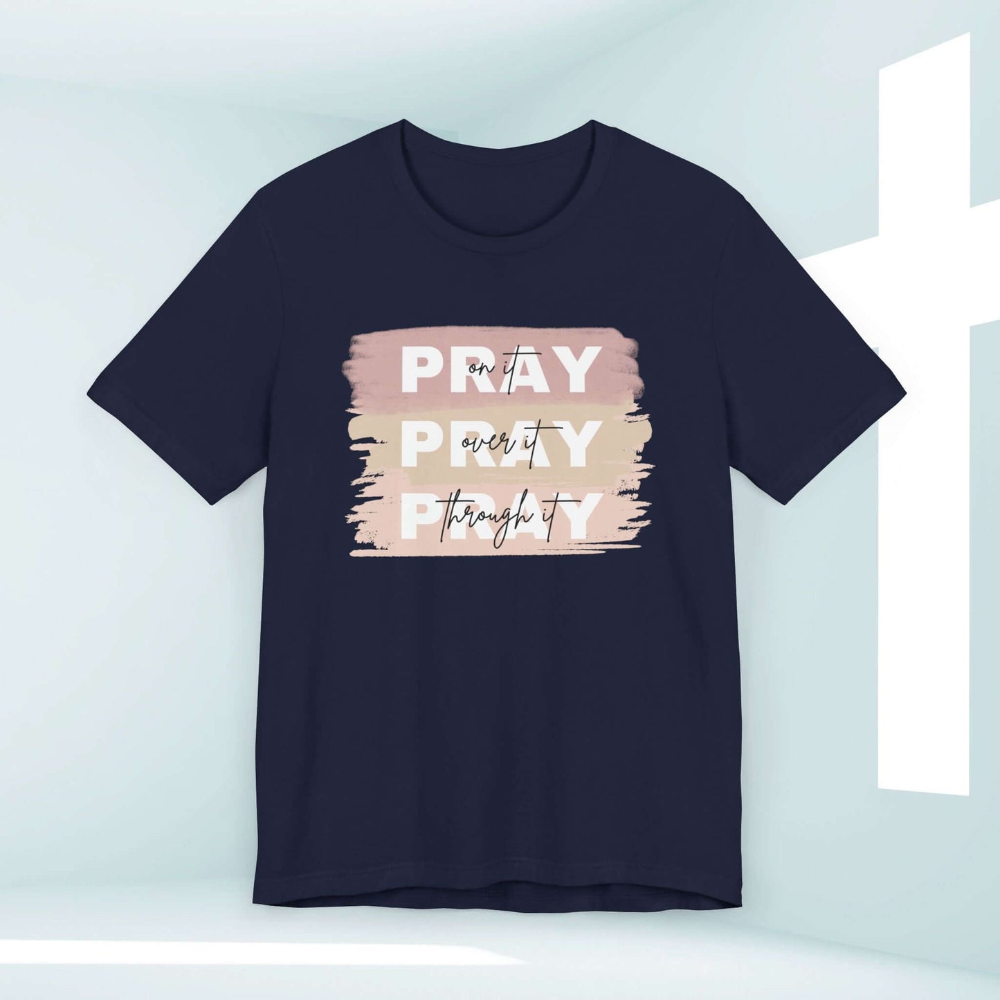 "Christian t-shirt for women with 'Pray On It, Over It, Through It' inspirational message in bold text on a navy background, Christian clothing apparel"