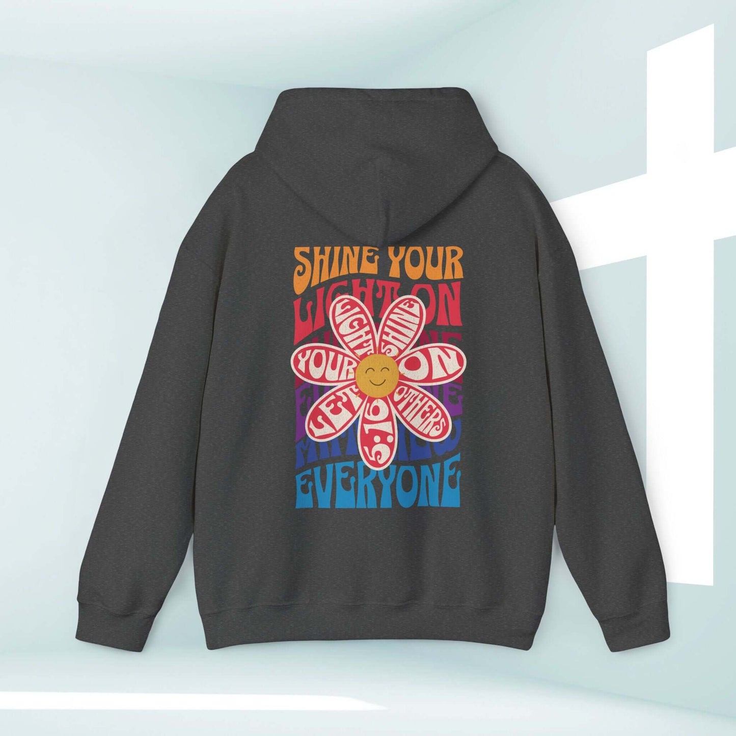 "Shine Your Light boho Christian hoodie with flower design, inspirational message, and bible verse, perfect Christian apparel for faith"