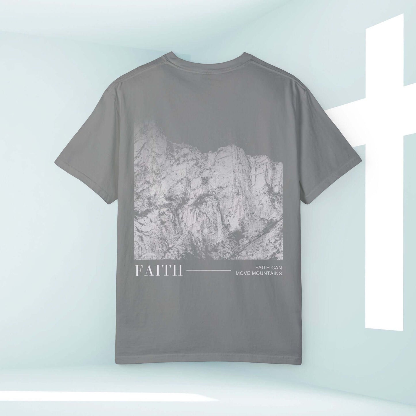 Faith Can Move Mountains christian tshirt with mountain graphic and cross in background