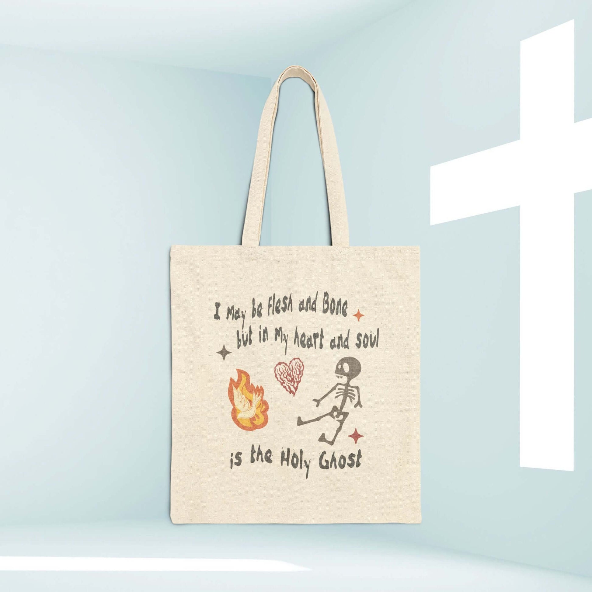 Christian Halloween tote bag with a skeleton design and scripture, perfect for a faith-inspired trick or treat experience.