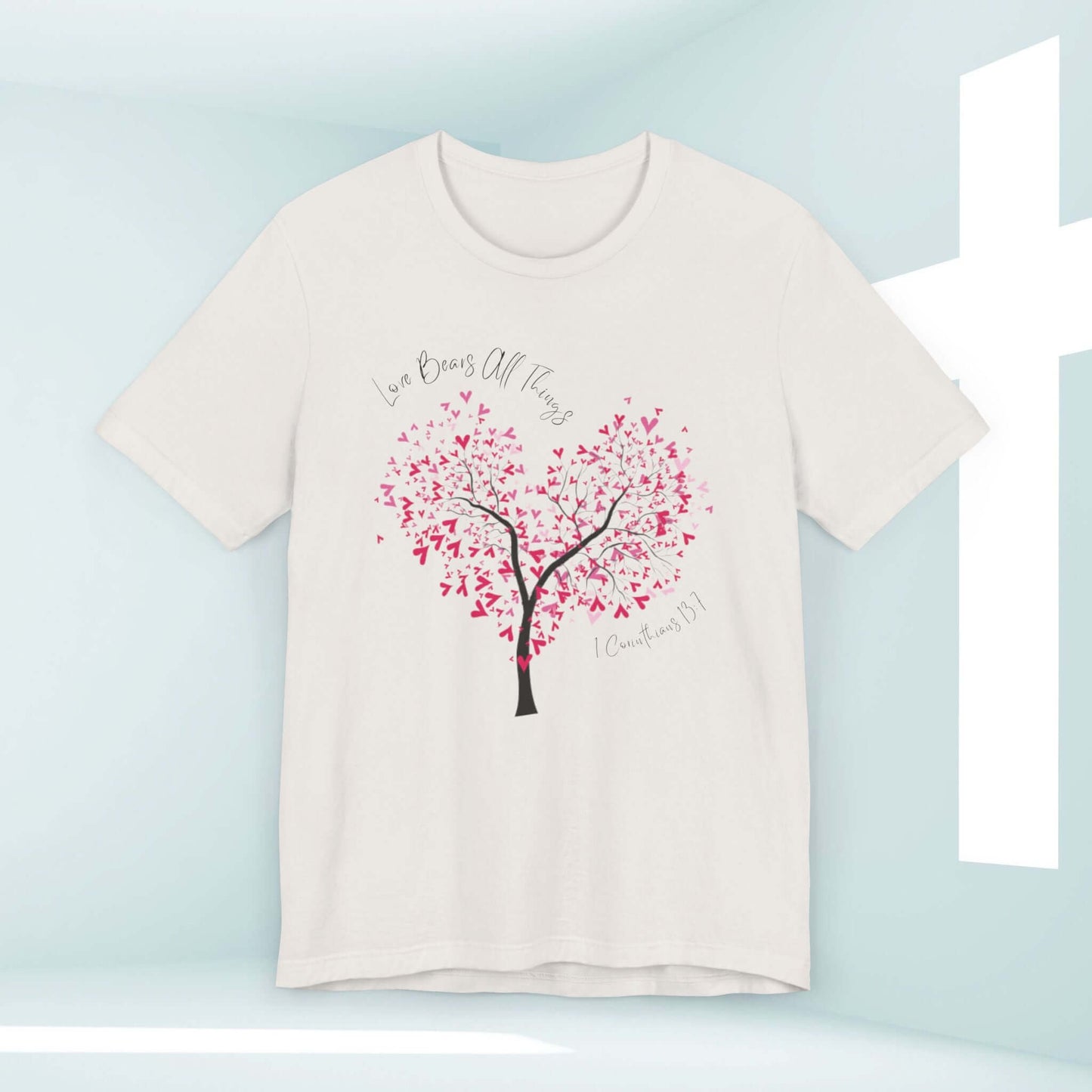 Christian Love Bears All Things t-shirt with heart-shaped tree and Bible verse design for weddings or Valentines.