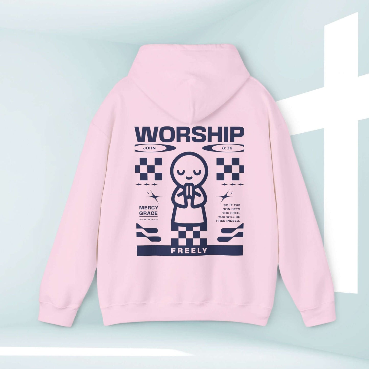 Pink Christian hoodie with faith-based graphic design, including "Worship Freely" text, ideal worship shirt, church shirt, Christian apparel.