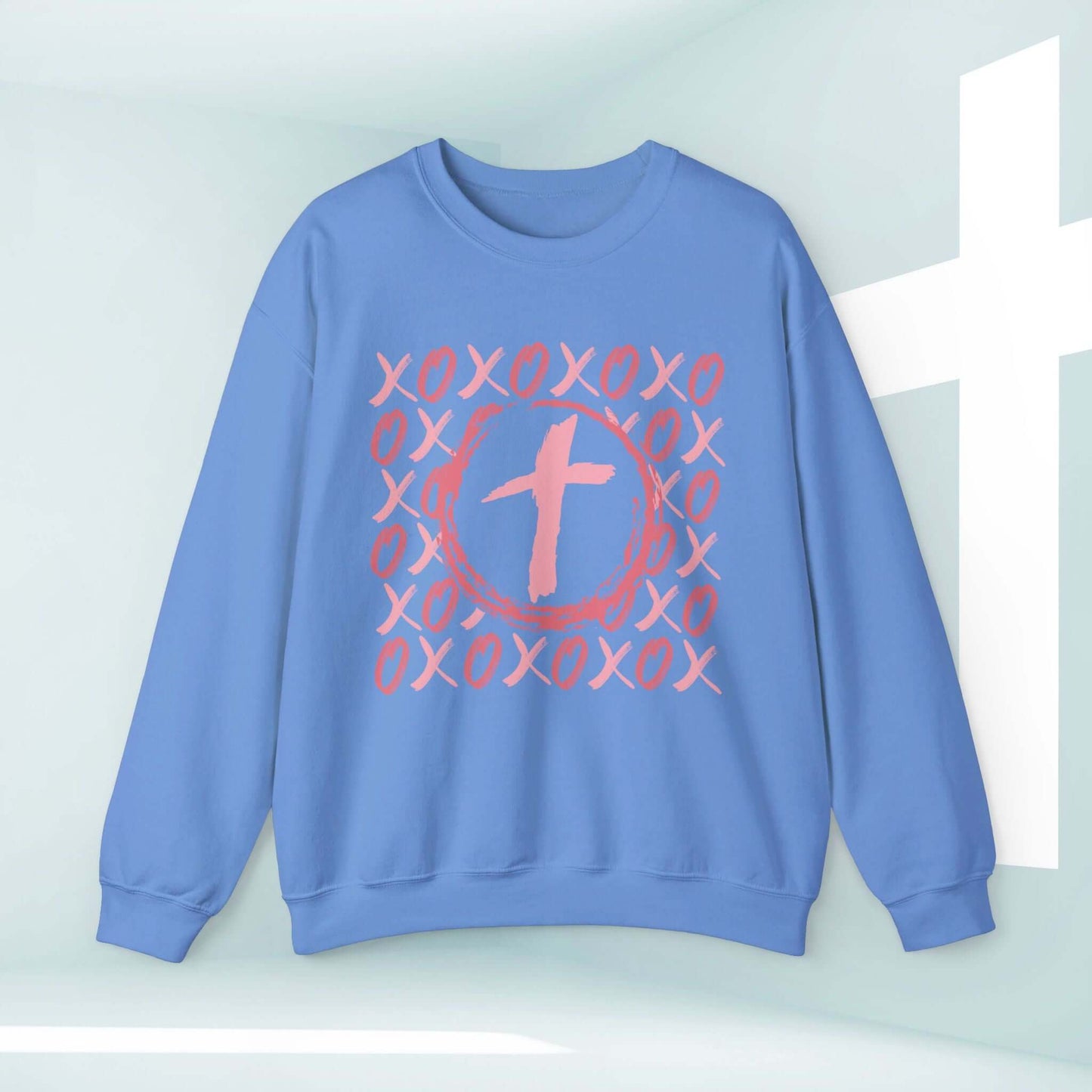 Christian wedding love sweatshirt with pink XOXO heart cross design, ideal for Valentine's Day, anniversaries, and weddings, made of ethical cotton.