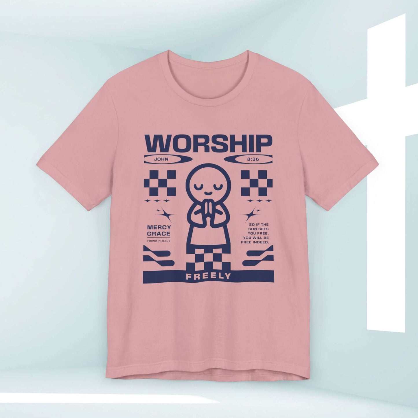 Worship Freely Christian t-shirt with graphic and Bible verse, pink prayer shirt for church, faith-based religious apparel.