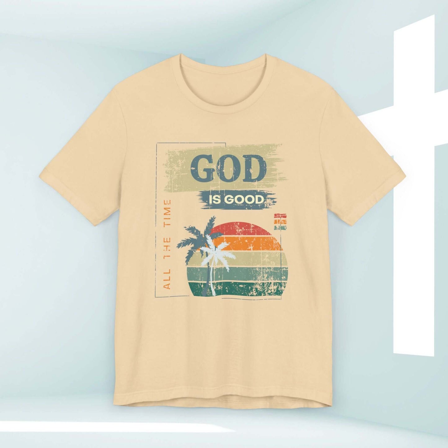 Beige women's Christian t-shirt with "God Is Good All The Time" text and palm tree graphic for summer, ideal for faithful inspiration.