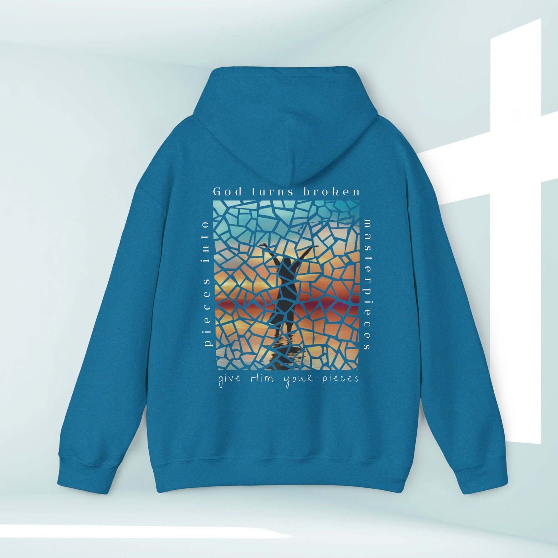 God Turns Broken Pieces Into Masterpieces Christian hoodie, blue hooded sweatshirt with inspirational mosaic cross graphic