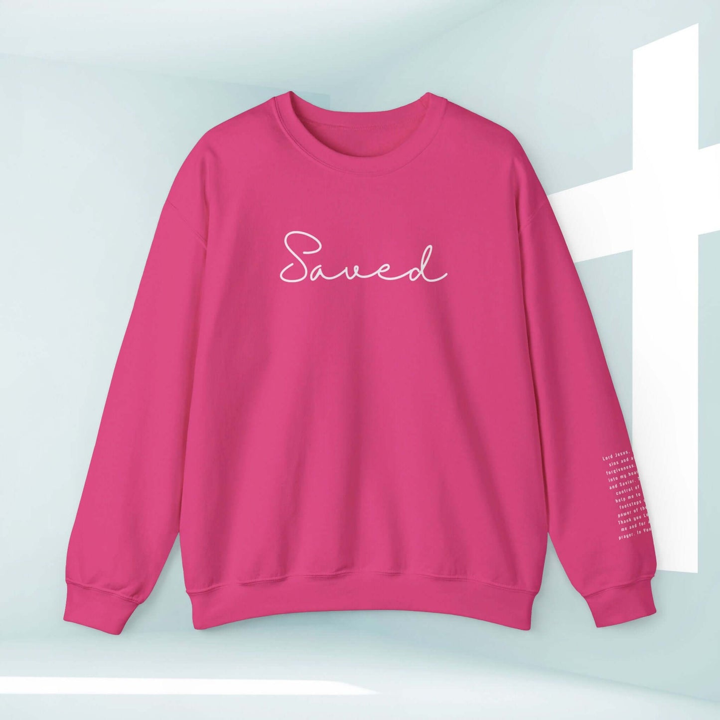 Saved Sinners Prayer Christian sweatshirt, faith-based inspirational crewneck, religious apparel in pink with Sinners Prayer on sleeve.