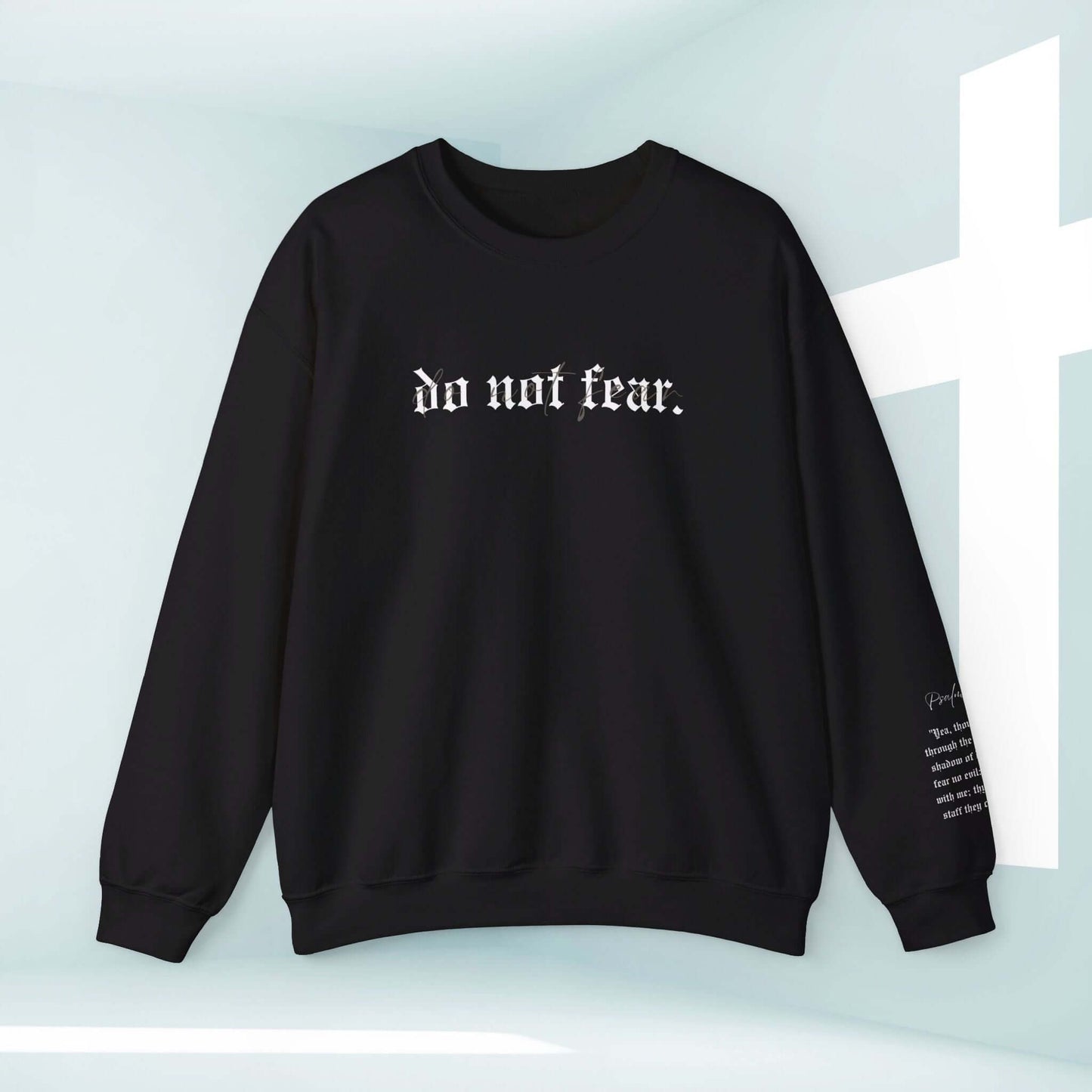 Black Christian sweatshirt with "Do Not Fear" text, promoting faith and featuring an inspiring bible verse. Ideal religious sweatshirt for believers.