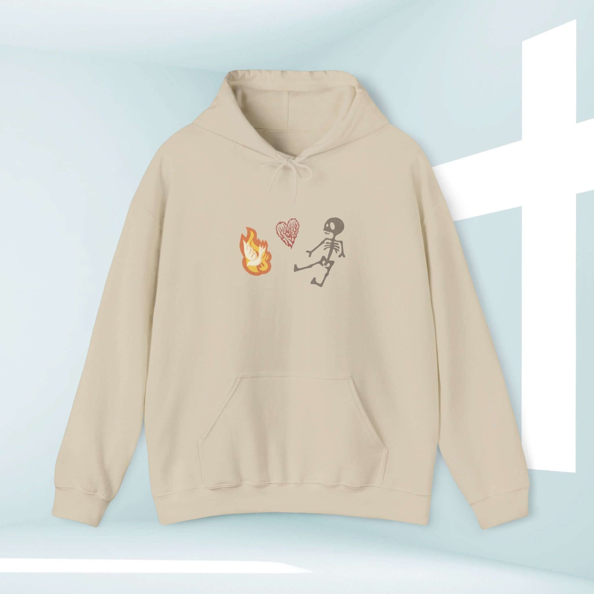 Beige Christian Halloween hoodie with dancing skeleton, heart, and flame design; perfect for faith-inspired Halloween celebrations.