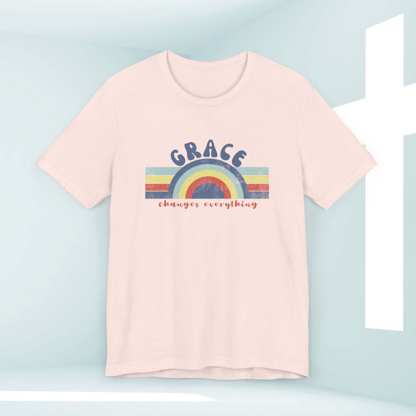 Retro Grace Changes Everything Women's Christian T-Shirt with faith-based graphic and uplifting message in a light background.