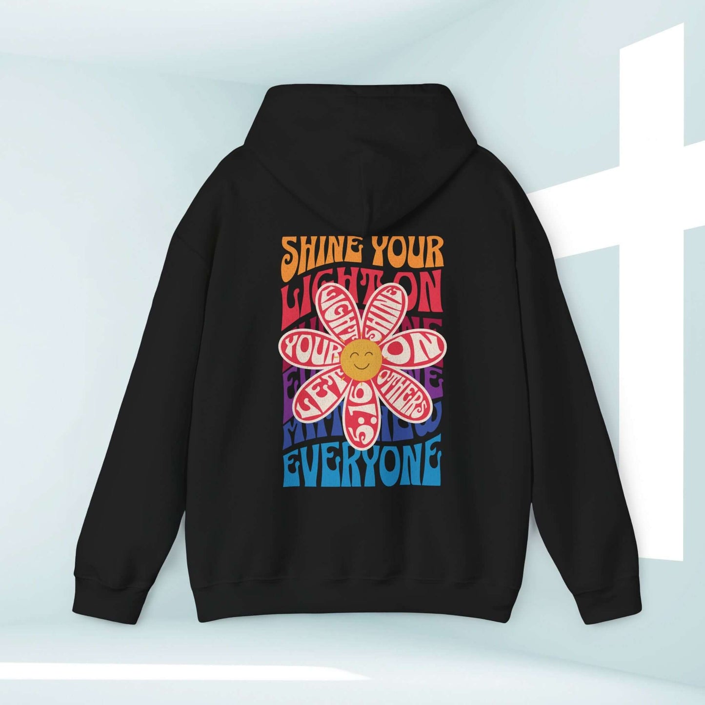 Christian hoodie Shine Your Light boho hooded sweatshirt with flower design and bible verse, black pullover faith-based apparel.