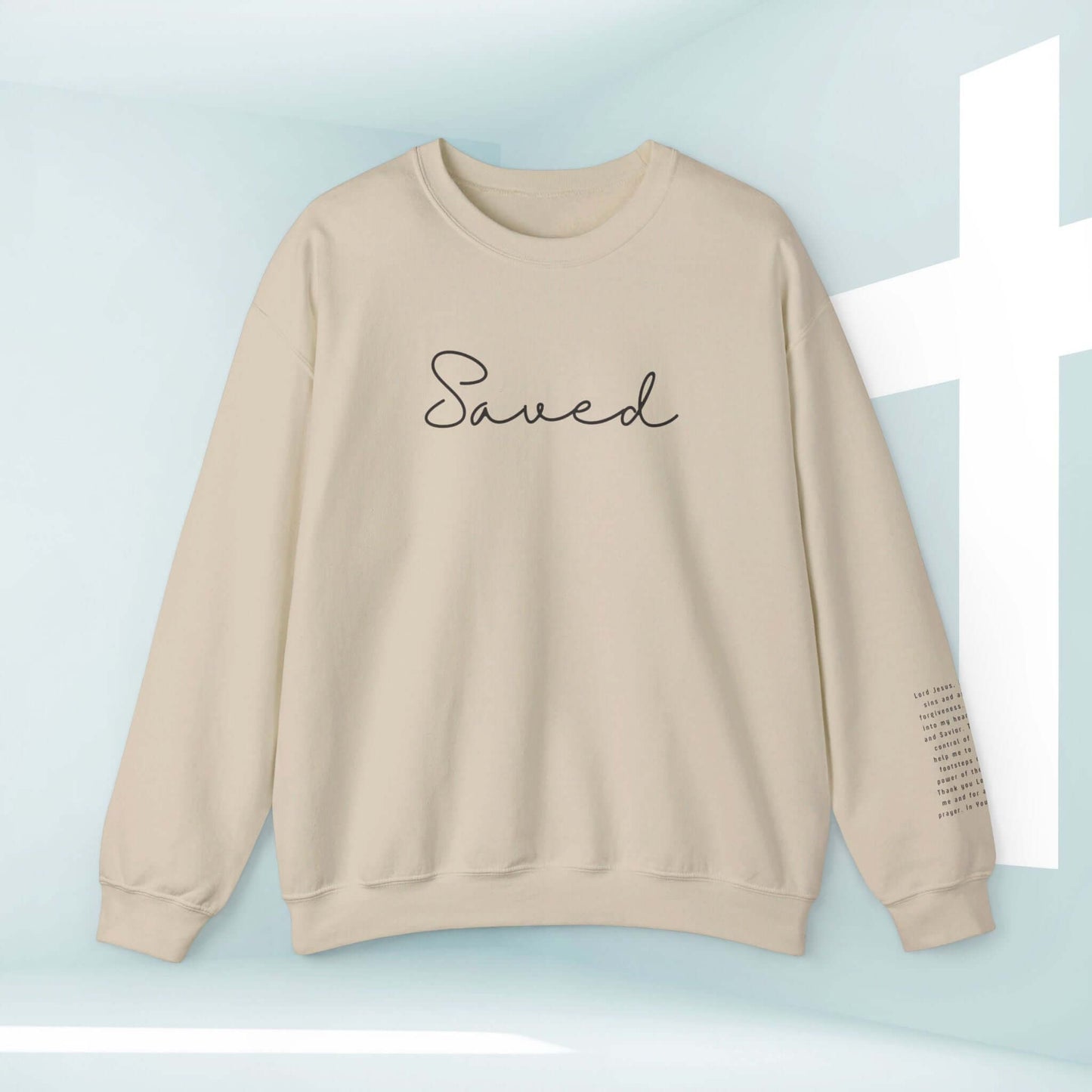 Christian sweatshirt with "Saved" text on front and Sinners Prayer on sleeve, inspirational faith-based apparel, perfect baptism gift.